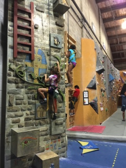 Grace climbing.